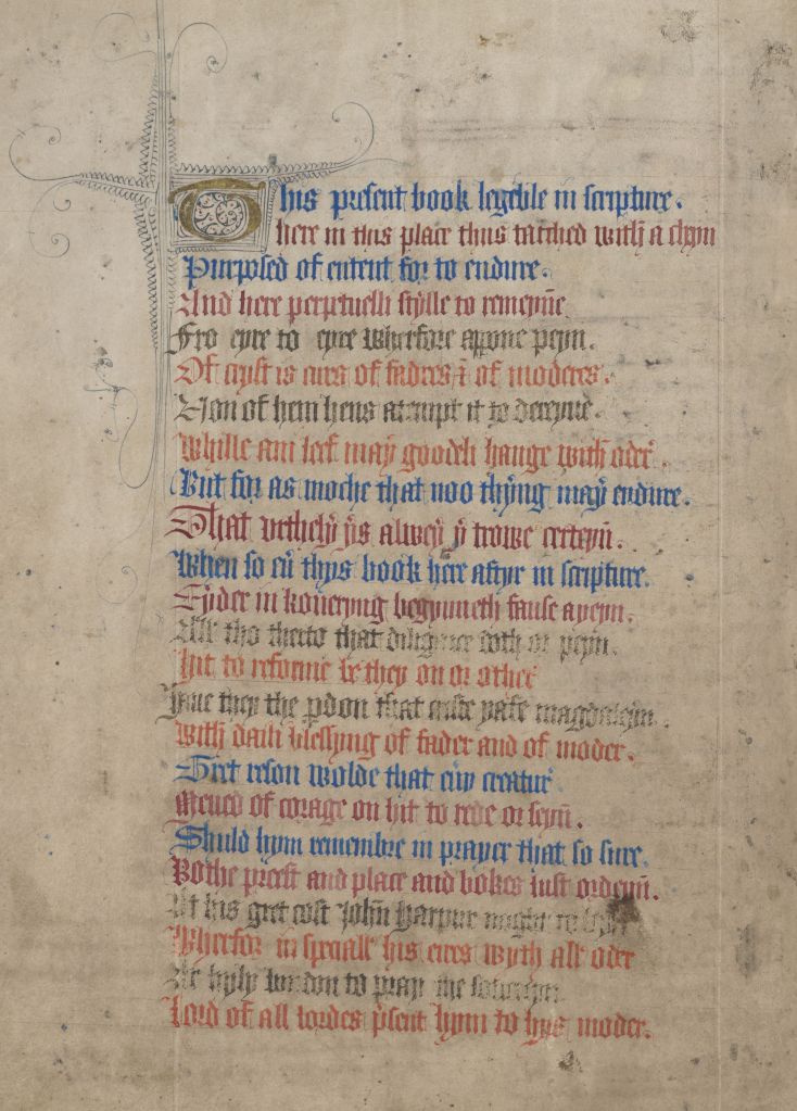 Text with lines written in alternating blue, red, and black inks.